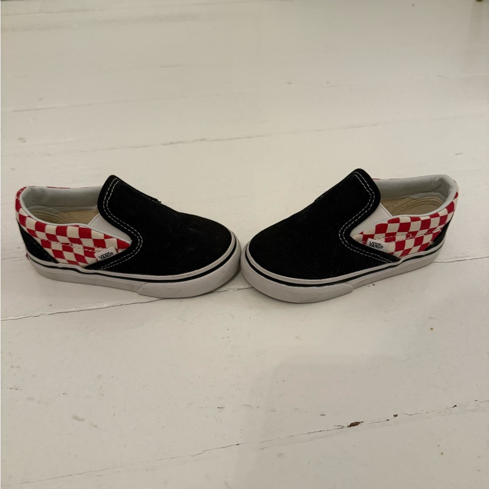 Vans Black and Red Checkered Slip-Ons